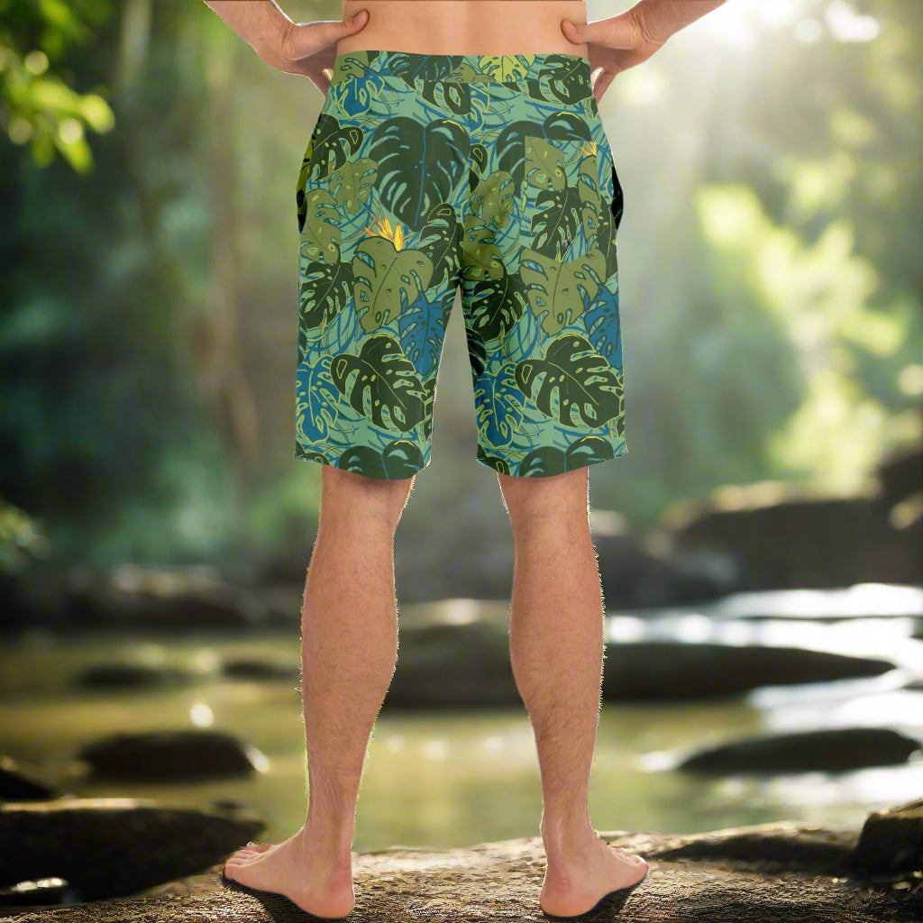 Boardshorts with tropical canopy monstera leaves and bird of paradise, rear view
