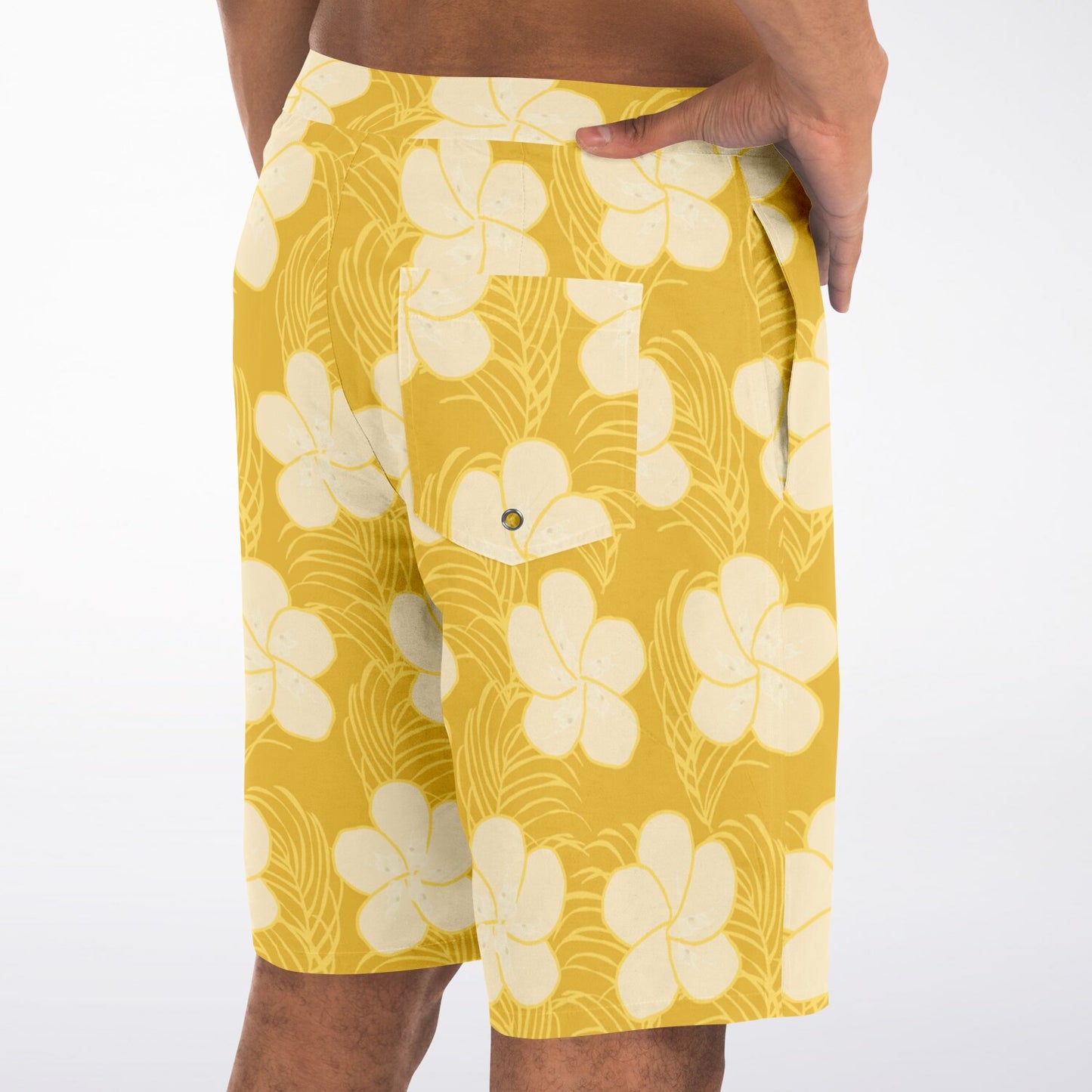 boardshorts rear view of cream frangipani on yellow background 
