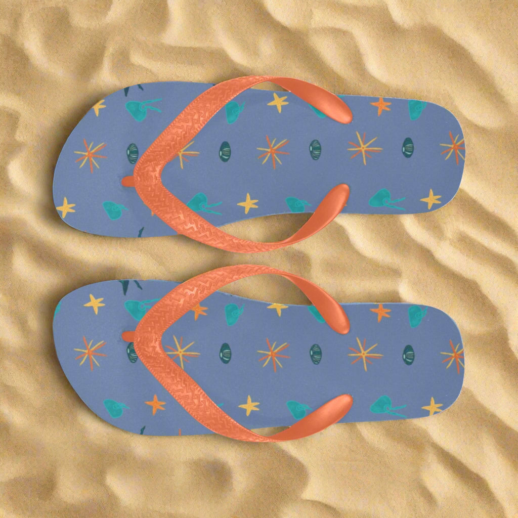 purple background with jelly fish and starfish designed flip flops
