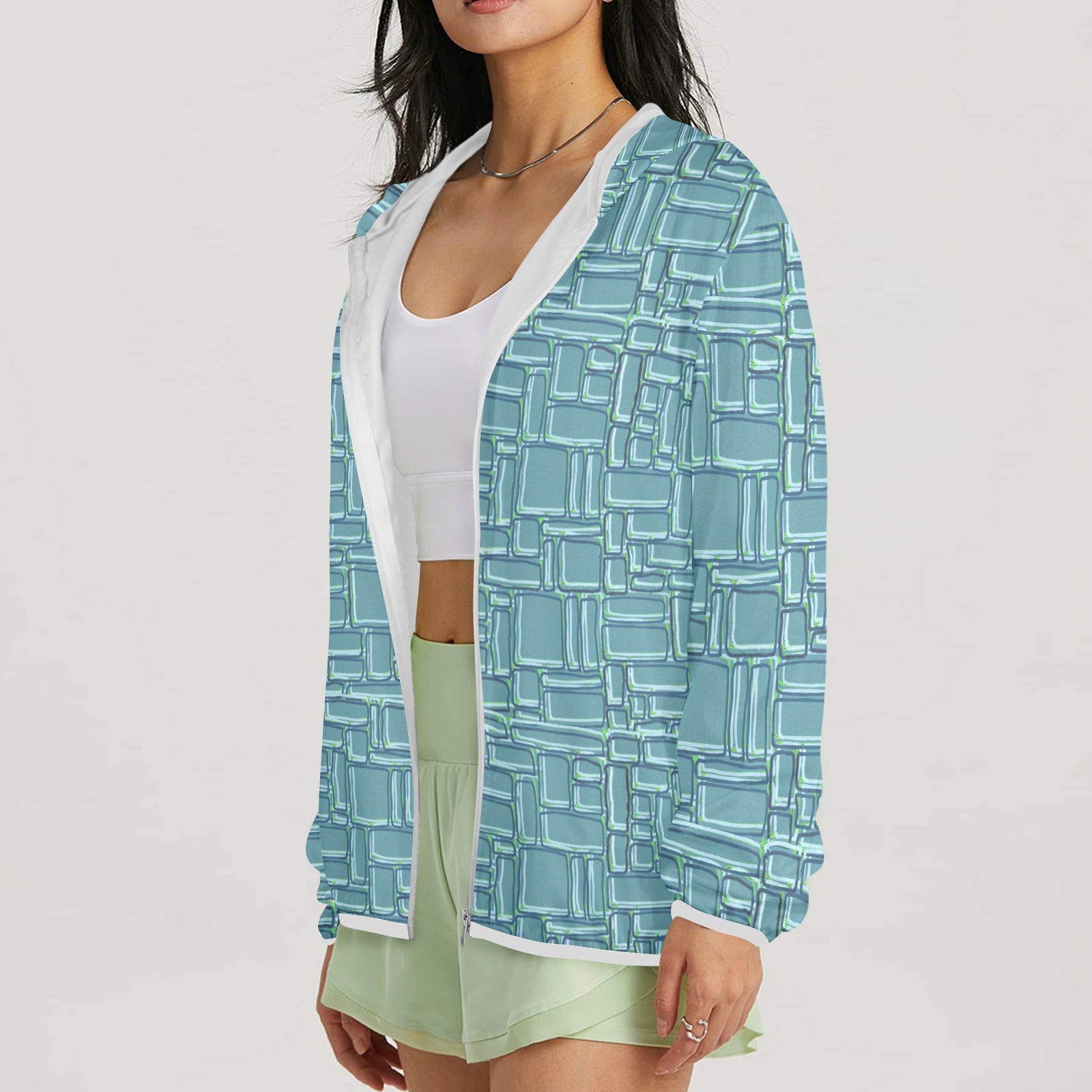 model wearing hand dran tropical temple stone zipped sun hoodie side view